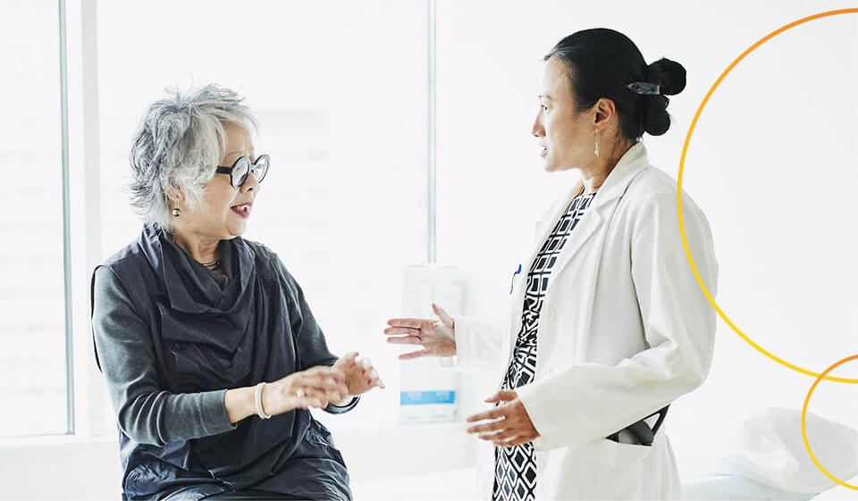 A patient talking with healthcare professional